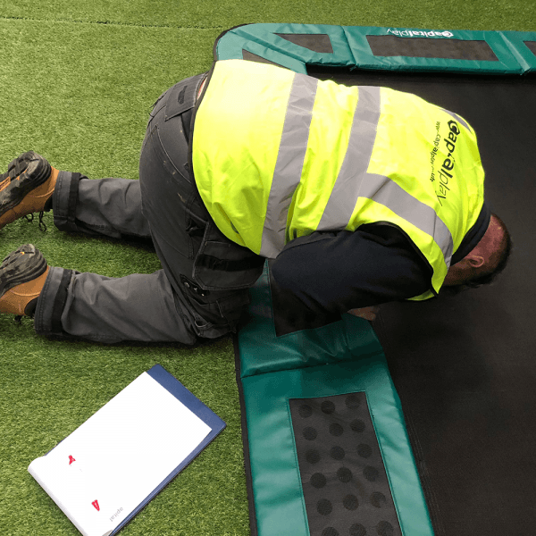Checking the trampoline pads